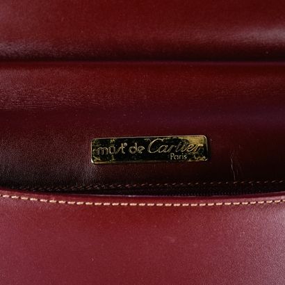 CARTIER, Must
Bordeaux leather briefcase
27.5...