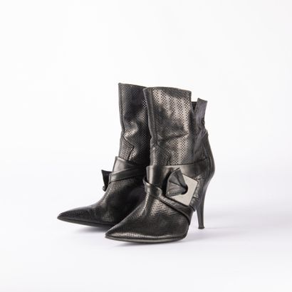 Lot including two pairs of boots and one...
