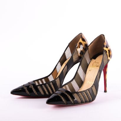 CHRISTIAN LOUBOUTIN. Black patent leather...