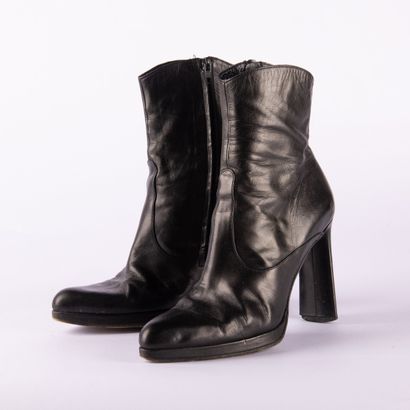 Four pairs of black heeled boots. 1/ CHARLES...