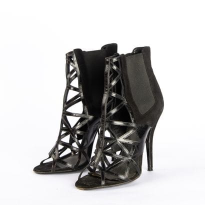 GIVENCHY. Black patent leather and black...
