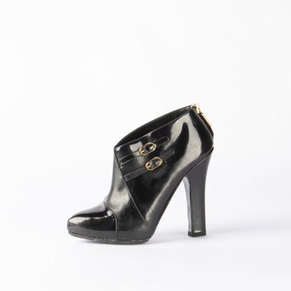DOLCE GABBANA. Pair of black patent leather...
