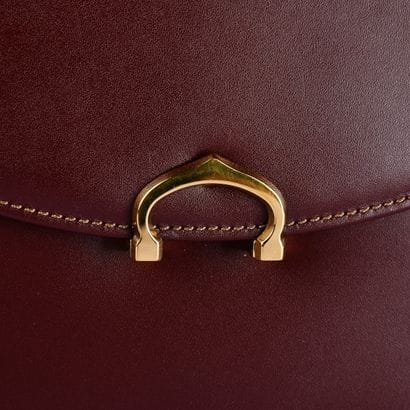 CARTIER, Must
Bordeaux leather briefcase
27.5...