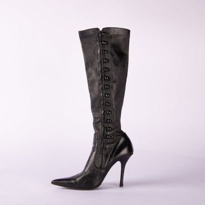 Lot including two pairs of boots and one...