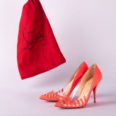 CHRISTIAN LOUBOUTIN. Pair of pumps in neon...