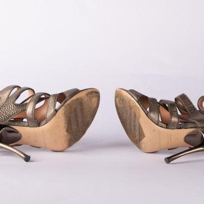 GIANMARCO LORENZI. A pair of gold-tone leather...