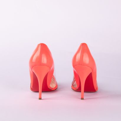 CHRISTIAN LOUBOUTIN. Pair of pumps in neon...