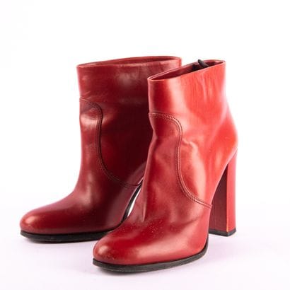 Lot of three pairs of shoes
PRADA. Red leather...