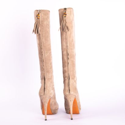 GUCCI. Heeled boots in gray suede calfskin,...