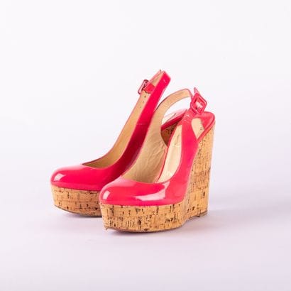 CHRISTIAN LOUBOUTIN. Pair of Altike wedge...