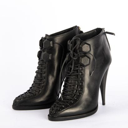GIVENCHY. By Riccardo Tisci. Black leather...
