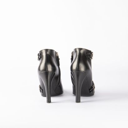 LOUIS VUITTON. Pair of black leather heeled...