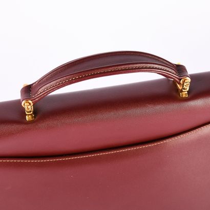 CARTIER, Must
Bordeaux leather briefcase
27.5...