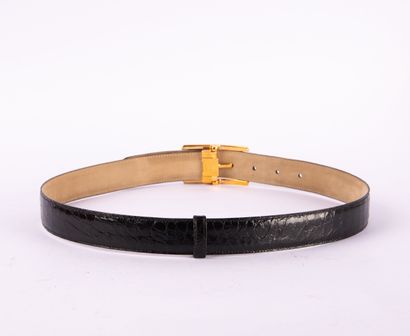 CARTIER. Black patent leather belt with brushed...