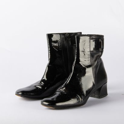 Four pairs of black heeled boots. 1/ CHARLES...