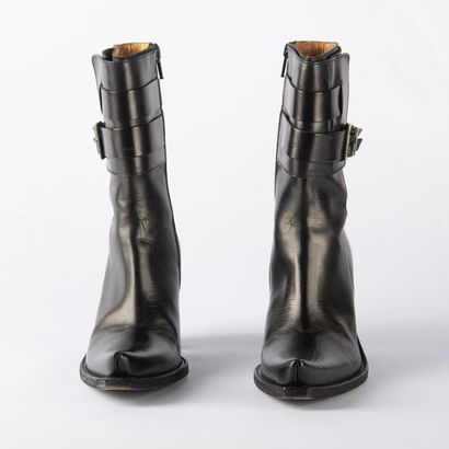 Four pairs of black heeled boots. 1/ CHARLES...