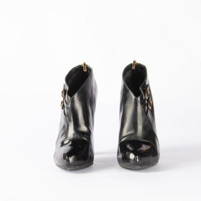 DOLCE GABBANA. Pair of black patent leather...