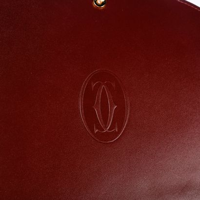 CARTIER, Must
Bordeaux leather briefcase
27.5...