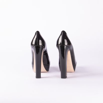 MIU MIU. Pair of black patent leather platform...