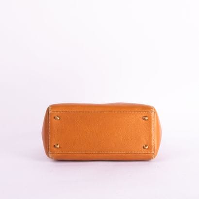 CHRISTIAN DIOR
Lady Dior bag in camel-colored...