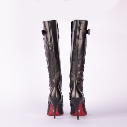 Lot including two pairs of boots and one...