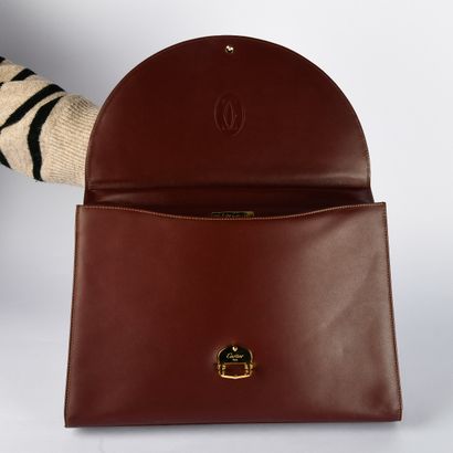 CARTIER, Must
Bordeaux leather briefcase
27.5...