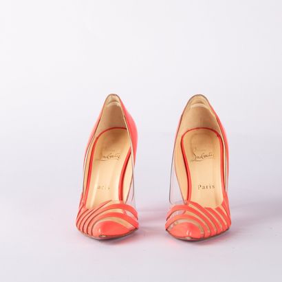 CHRISTIAN LOUBOUTIN. Pair of pumps in neon...