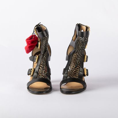 CHRISTIAN LOUBOUTIN. Pair of heeled sandals...
