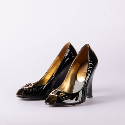 Lot of four pairs of black pumps. 1/ BRUNO...