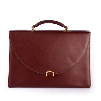 CARTIER, Must
Bordeaux leather briefcase
27.5...