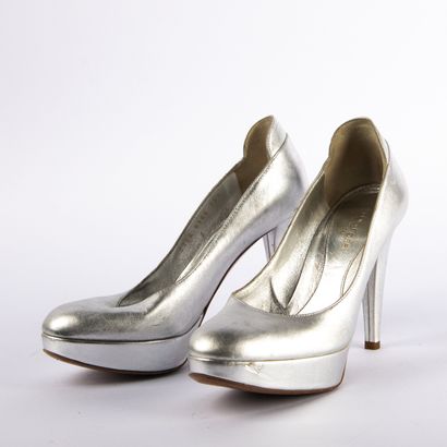 Lot of three pairs of shoes
PRADA. Red leather...