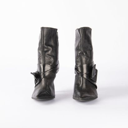 Lot including two pairs of boots and one...