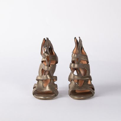 GIANMARCO LORENZI. A pair of gold-tone leather...
