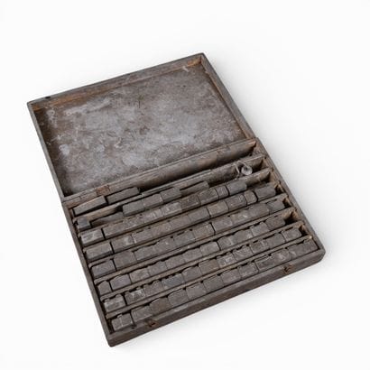 Case containing a set of hand-printing stencils...