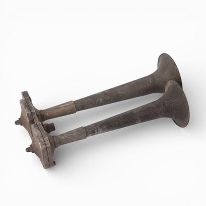 A metal horn with double horns marked 