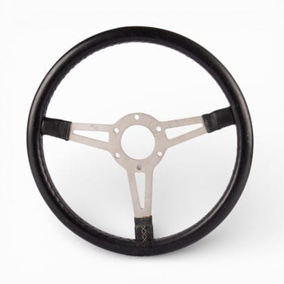 FUSINA
Black leather steering wheel with...