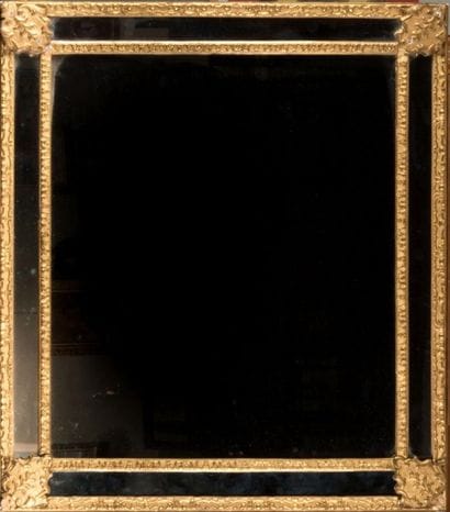 Miroir encadrement à parecloses baguettes...