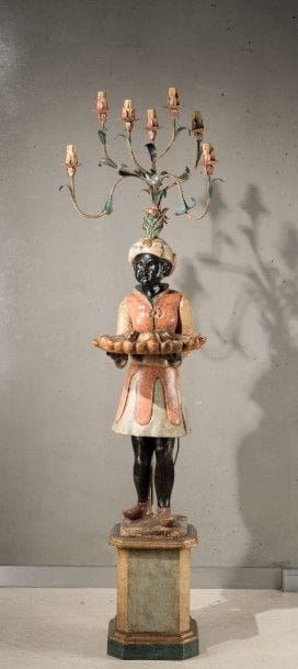 Nègre porte torchère en bois sculpté et doré...