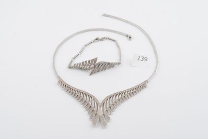 A charge
Parure comprenant collier et bracelet...