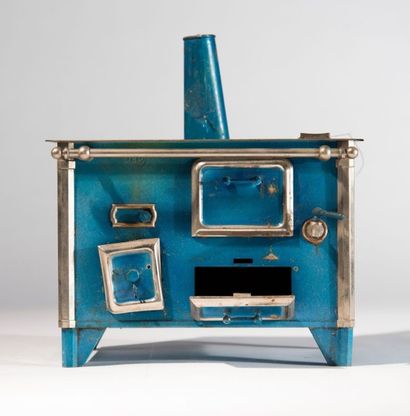 Fourneau de poupées, en tôle bleu et gris.
H:...