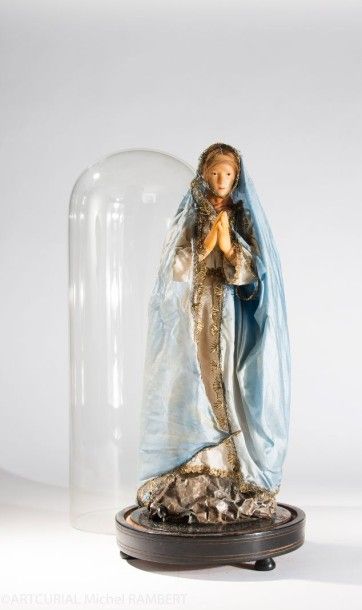 Vierge en cire sous globe
H: 55 cm