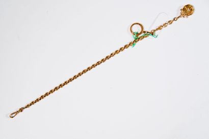 Chaîne de gousset et pendentif, en or.
Poinçon...