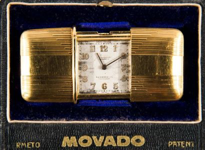 MOVADO

Montre-réveil en or jaune. Cadran:...