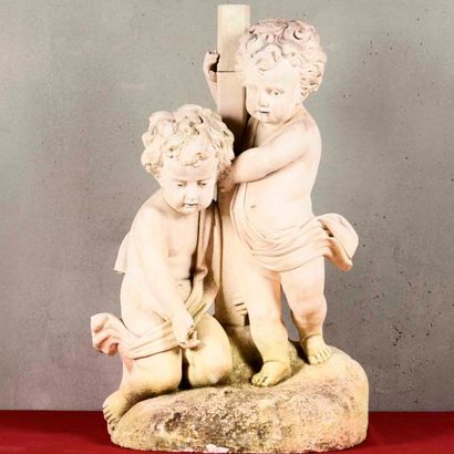 Deux angelots sur un tertre. Sculpture en...