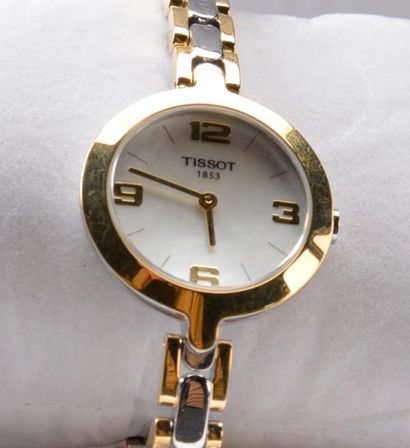 TISSOT.
Montre bracelet de femme en métal...