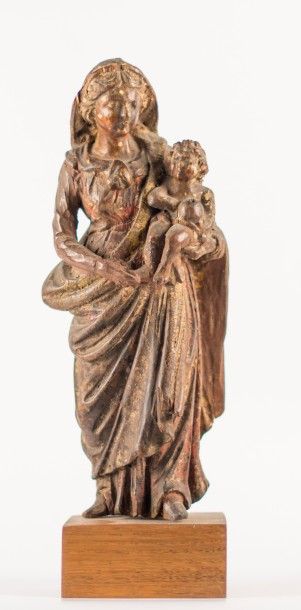 Vierge à l'enfant.
Sujet en bois sculpté,...