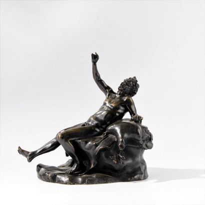 Satyre ivre en bronze. Epreuve à patine brun-noir....