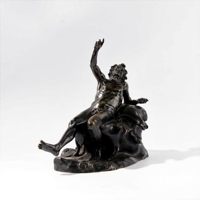 Satyre ivre en bronze. Epreuve à patine brun-noir....