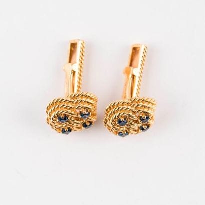 Paire de boutons de manchettes de la maison...