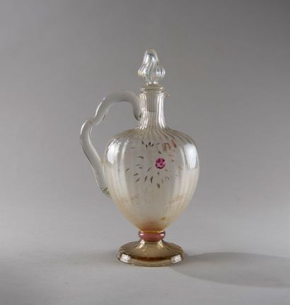 Emile GALLE (1846-1904). Carafe à côtes torses,...